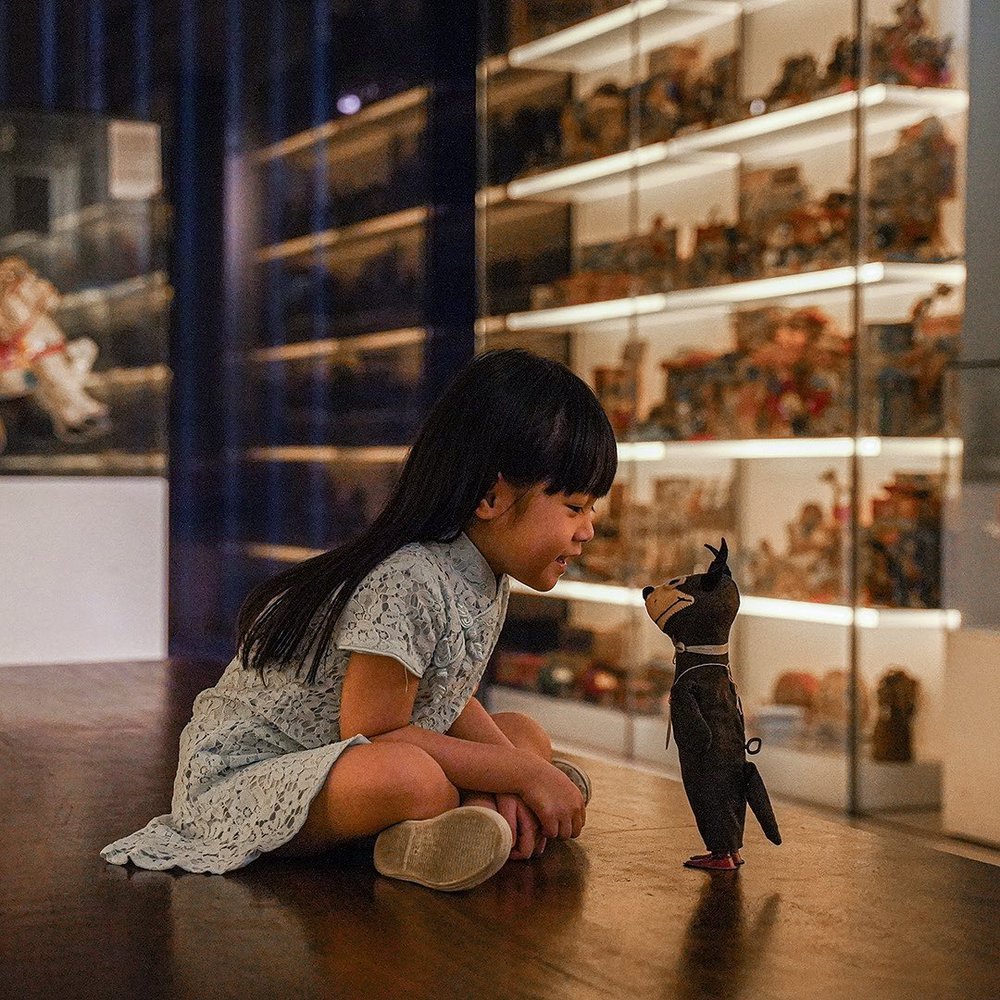 A kid playing with a toy 