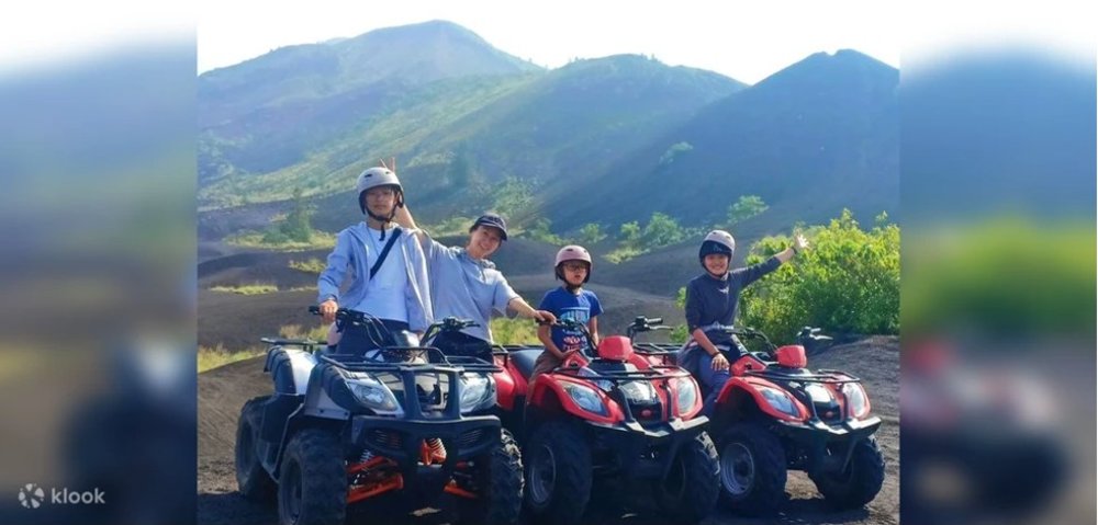 Family riding an ATV for a road trip