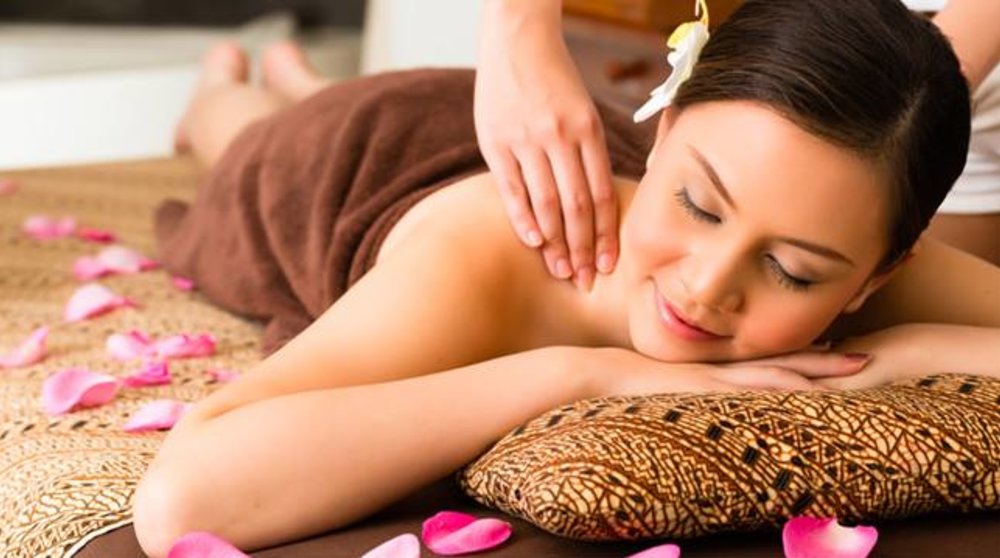 Girl having a back massage