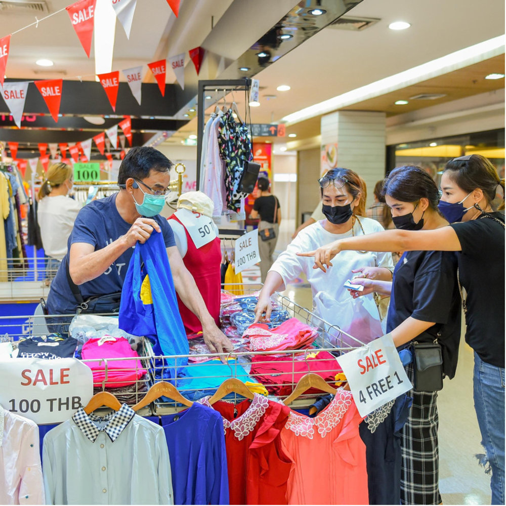 Group of girls buying clothes