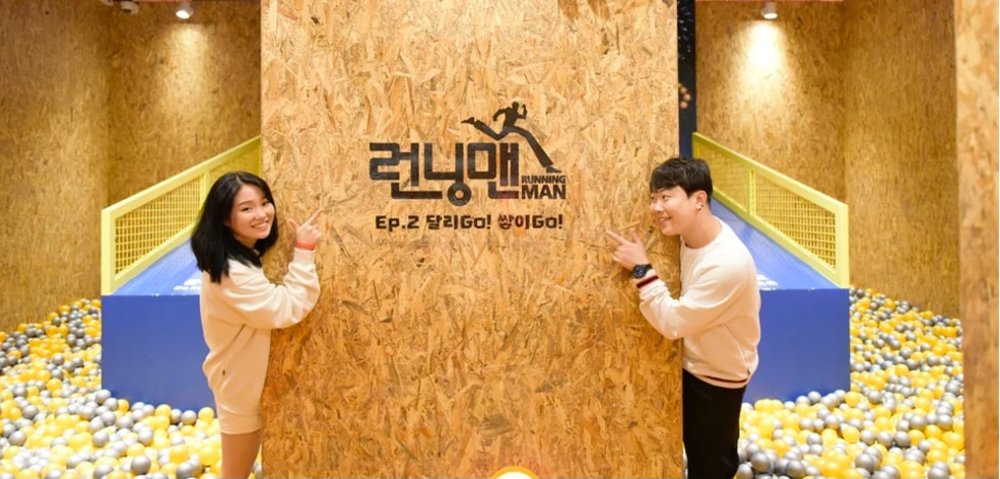 Friend playing in the running man thematic center