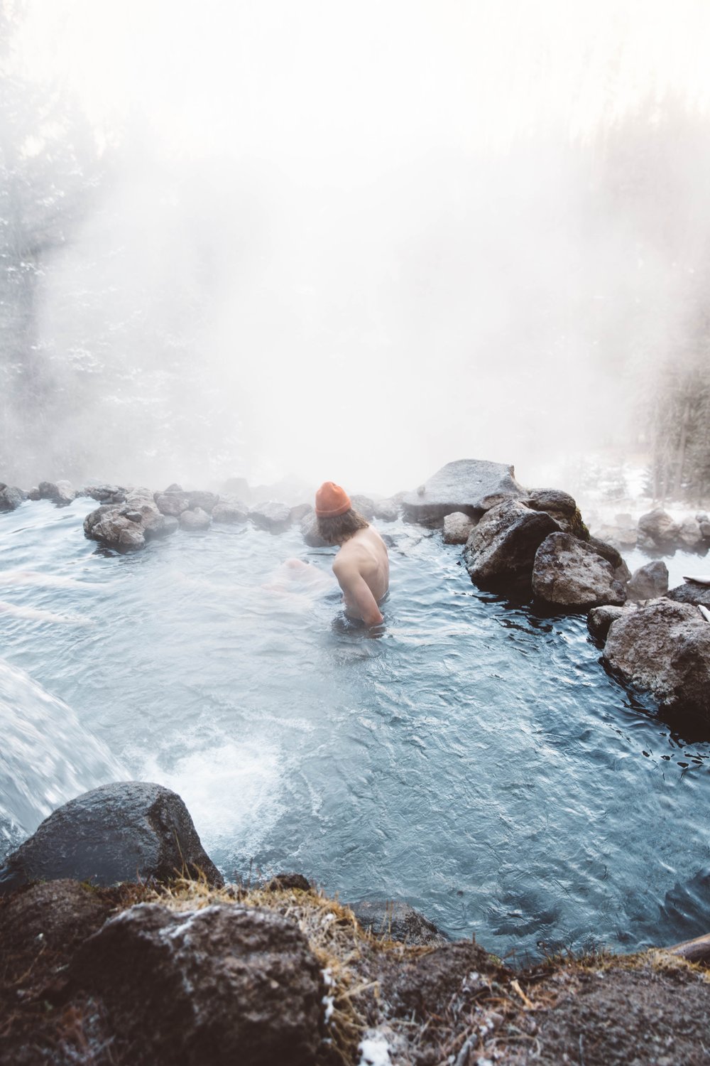 Boy bathing in hot spring