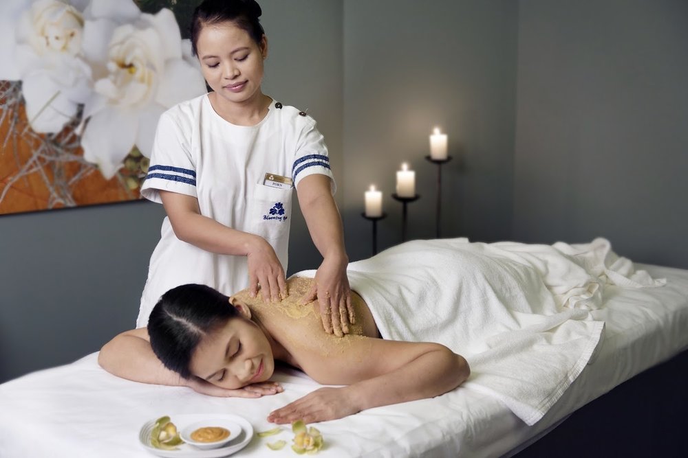 Woman enjoying a massage at Let's Relax Spa