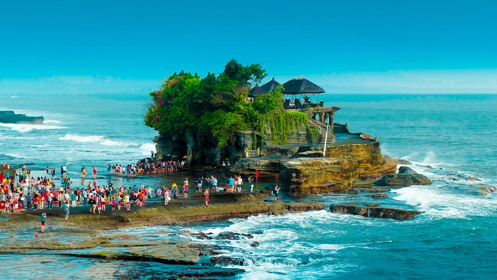 “Tanah Lot” means “land in the sea.”  Image credits: Eyestetix Studio on Unsplash