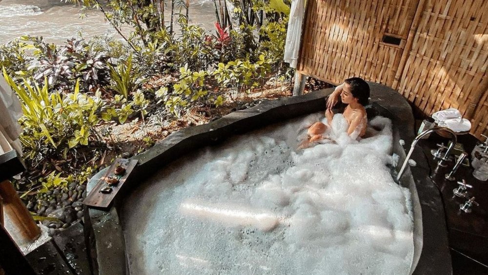 Sit back and relax as you watch over the Ayung River. Credits: @regenerativetravel