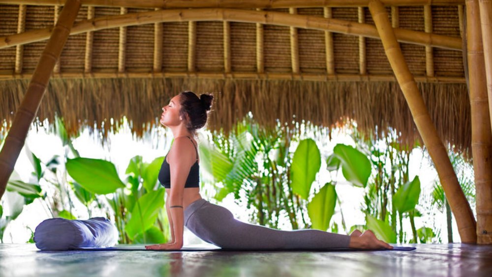 Get to learn various yoga positions while in Bali.