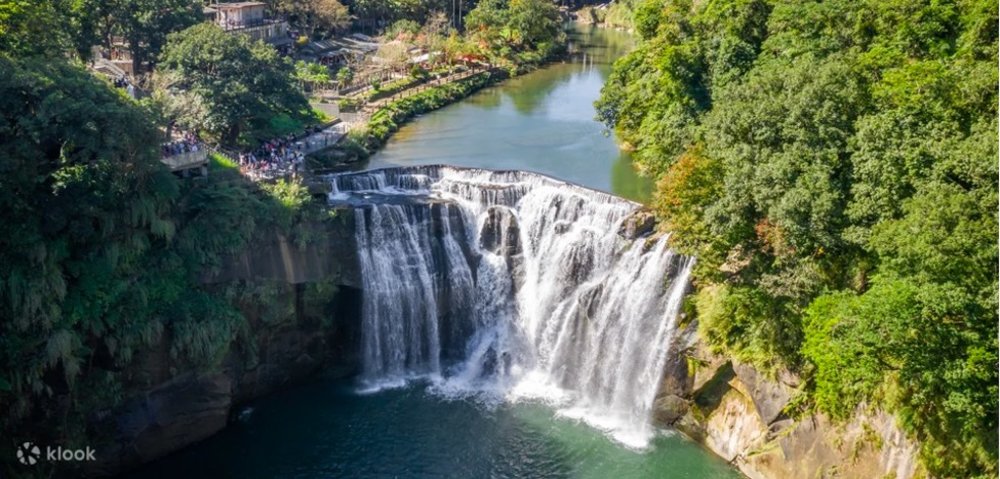 Waterfalls surrounded with trees and nature
