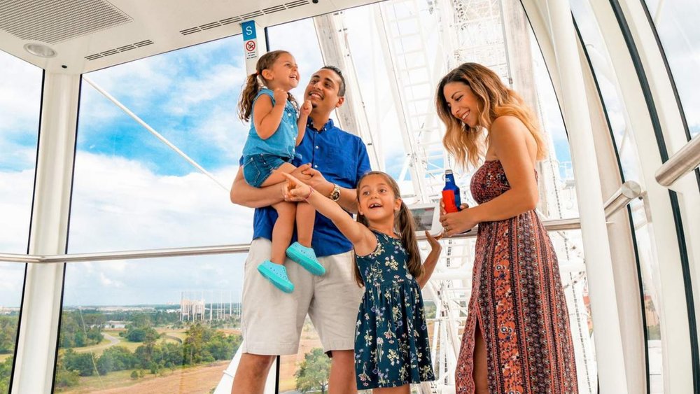 Family enjoying at The Wheel at ICON Park