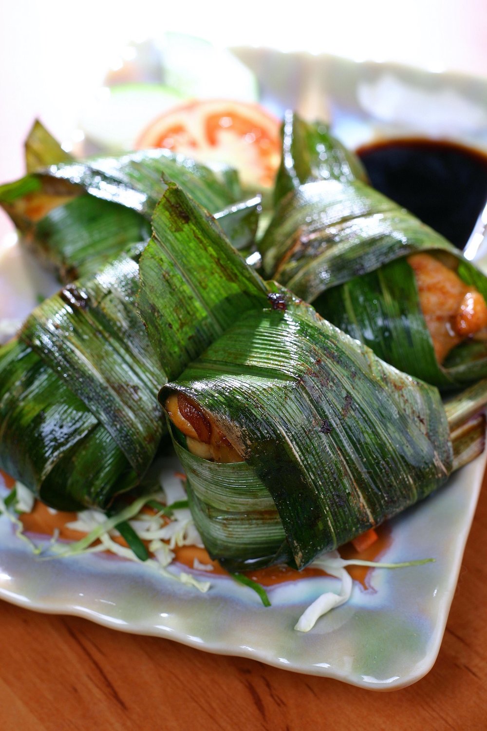 Thai food wrapped in banana leaf