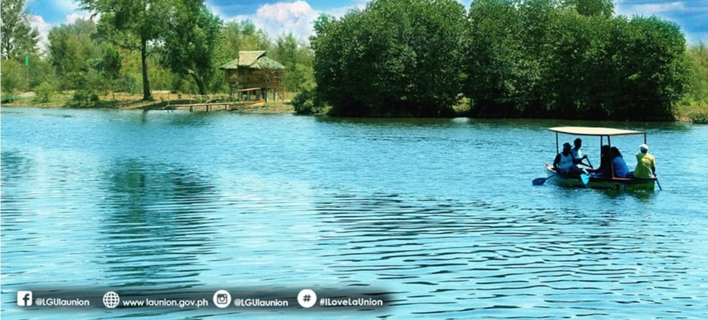 Two man in a boat sailing in the sea