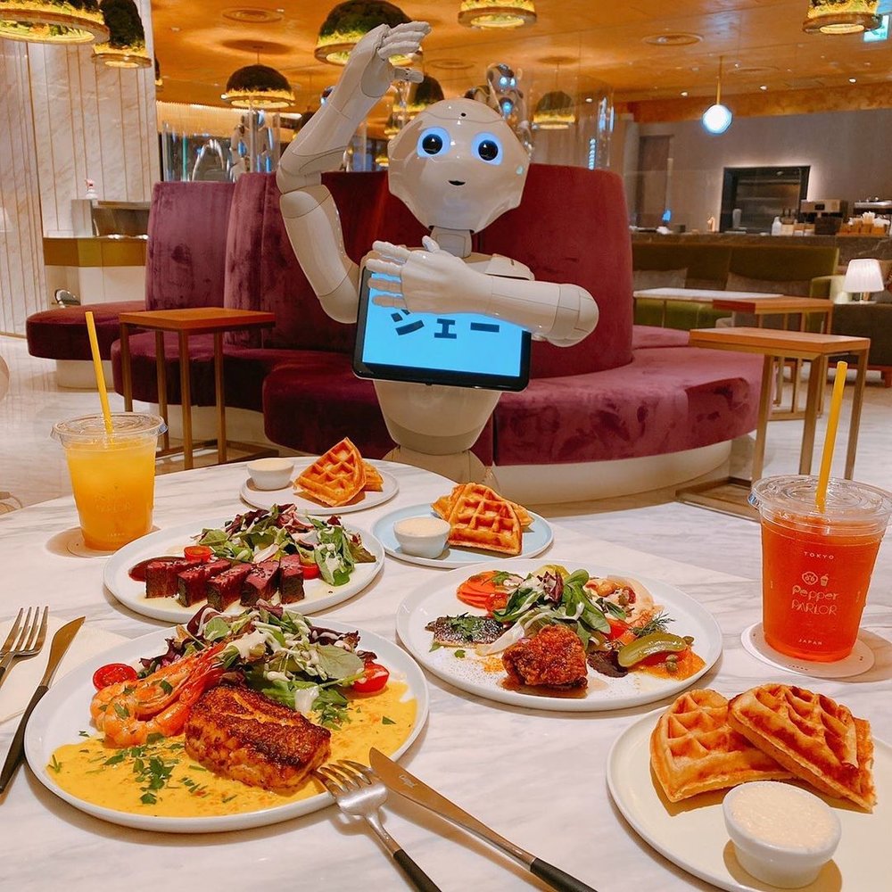 Robot with a different dish in the table