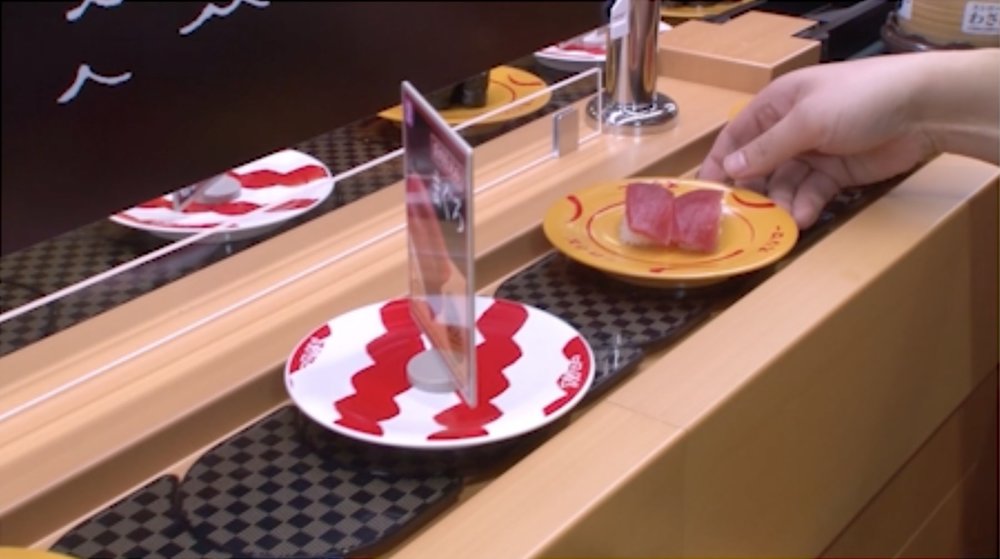 Sushi in conveyor belt