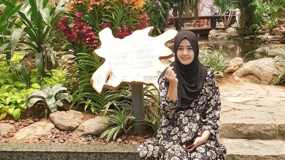 Spot the koi fish swimming around the pond in the garden. Credit: icha_yaricaeryana