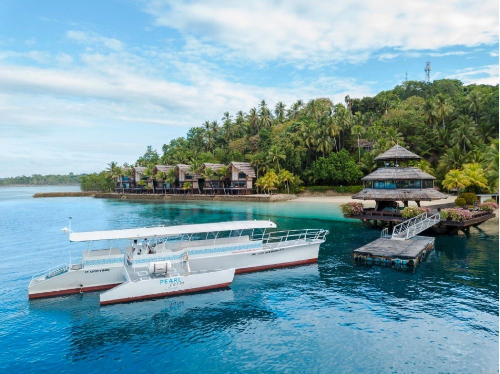 Boat in a crystal water beach