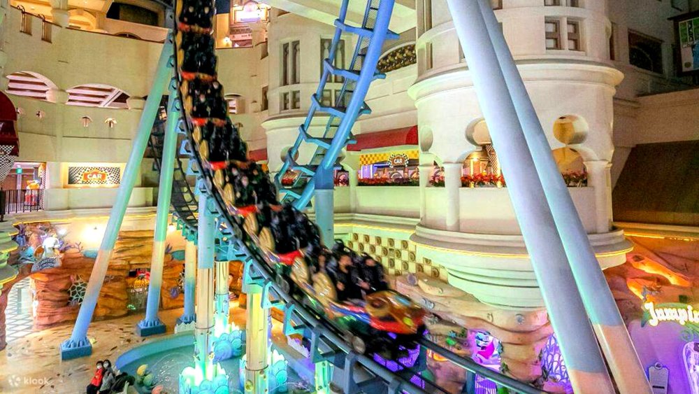 Zip through the indoor park on French Revolution, an indoor coaster with a loop-de-loop. 