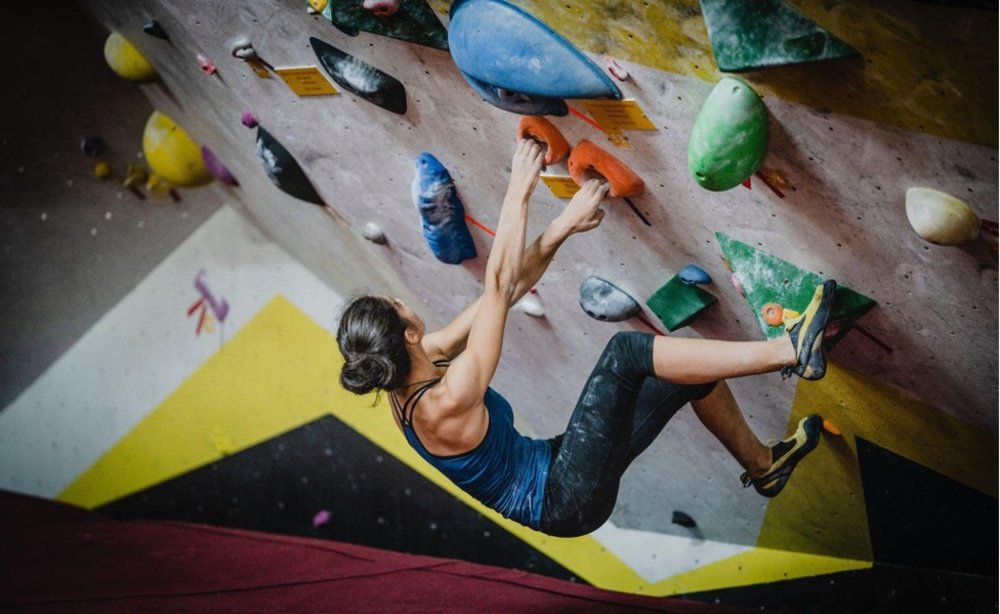 Girl wall climbing