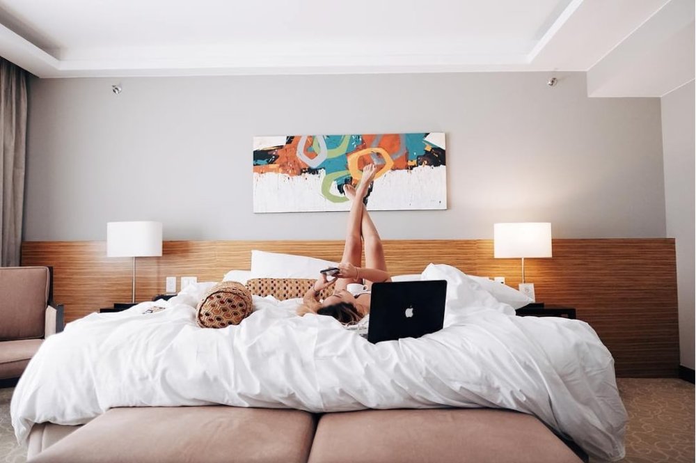 Girl in the bed with her cellphone