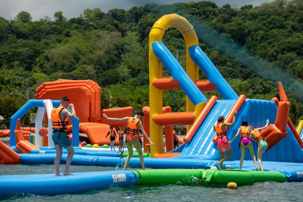 People playing in the inflatbale island