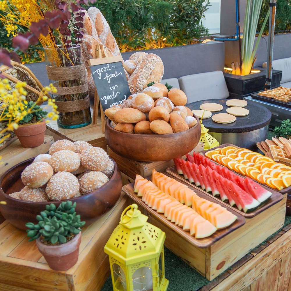 Pastries and fruits in the breakfast table
