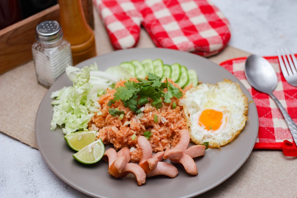 Egg with sausages in the side