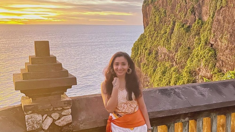 Caption: Head inside the Uluwatu Temple for uninterrupted views of dramatic cliffs and crashing waves. Credit: jetsetinheels