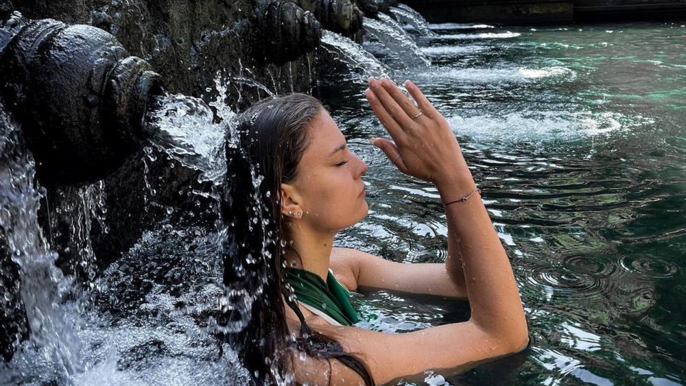 Take part in the purifying ritual at Tirta Empul Temple. Credit: _misel_