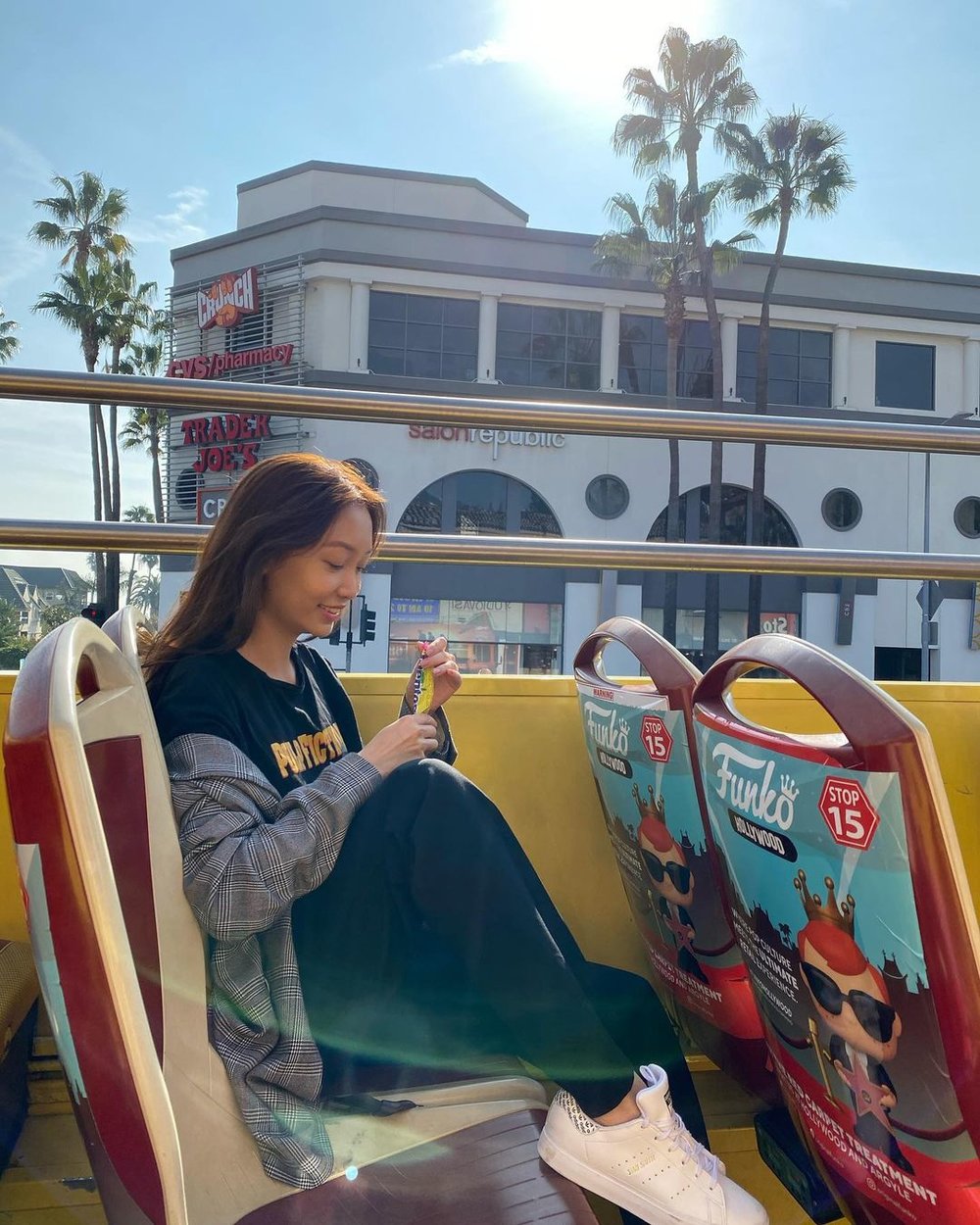 woman on an LA Hop On Hop Off Bus