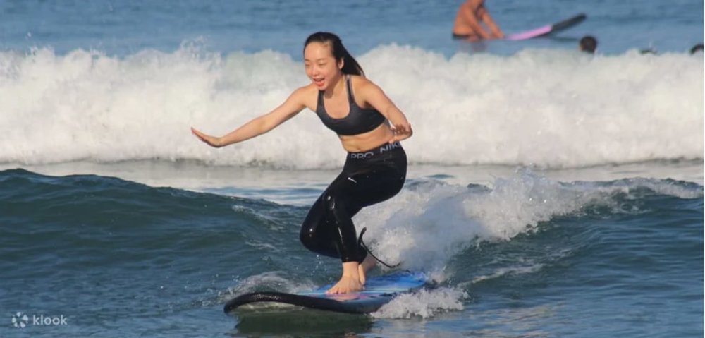 a girl surfing