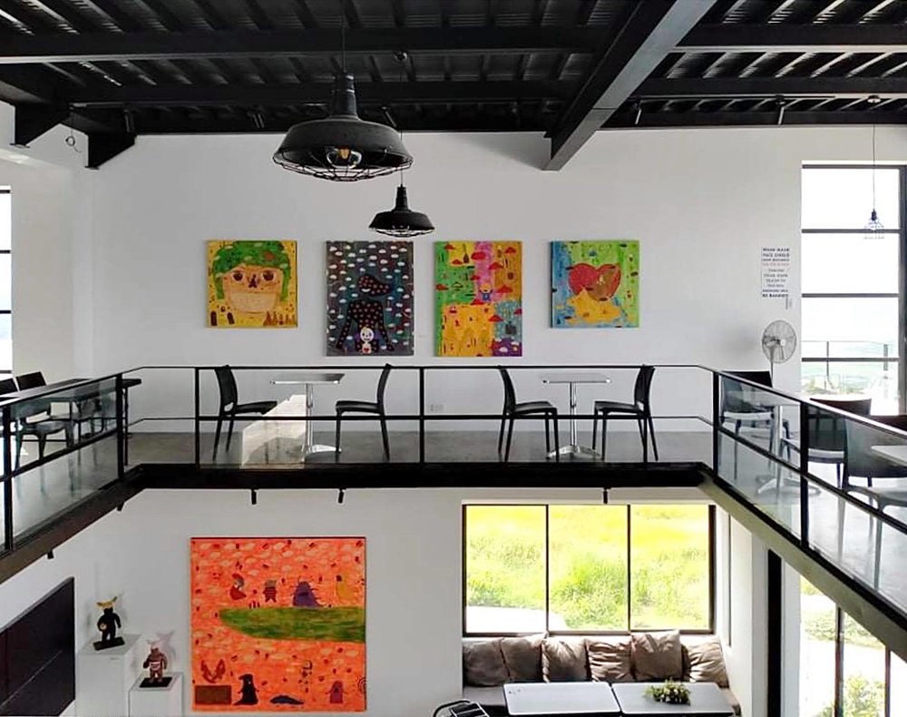 paintings inside a cafe