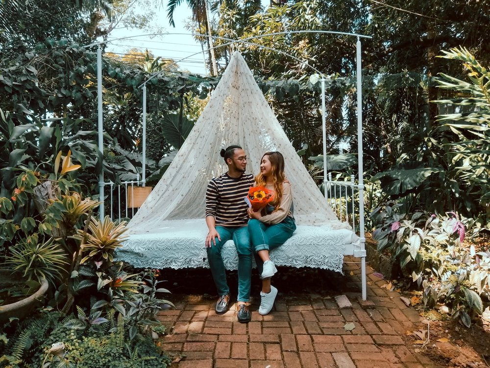 Couple sitting in bed