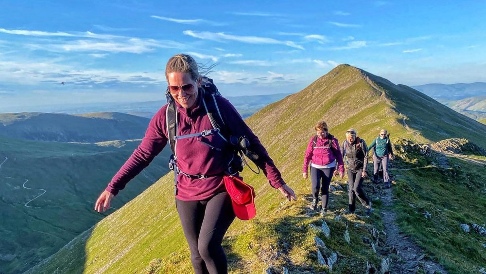 Besides charming villages, Lake District also has some great hiking trails like the one up Helvellyn.