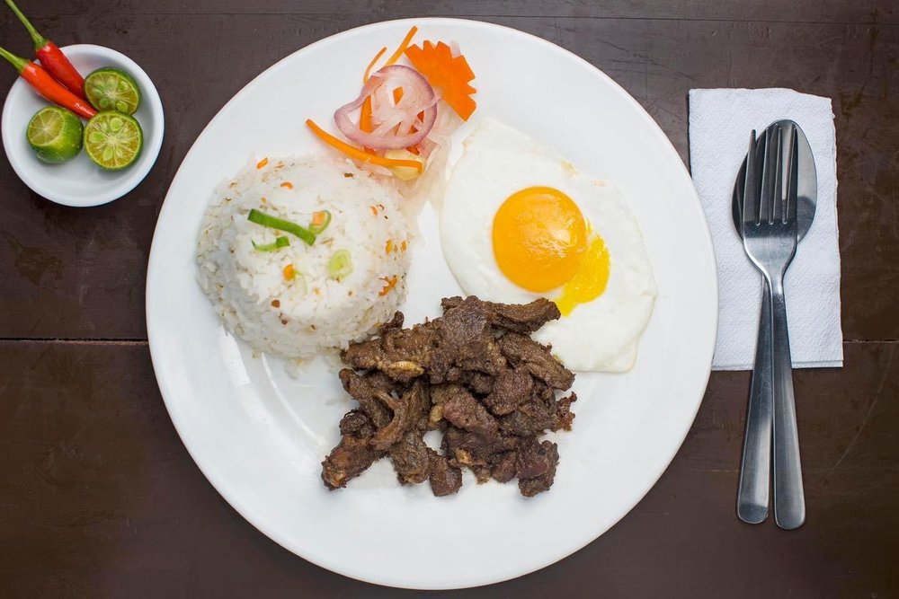 Breakfast dish with egg and meat