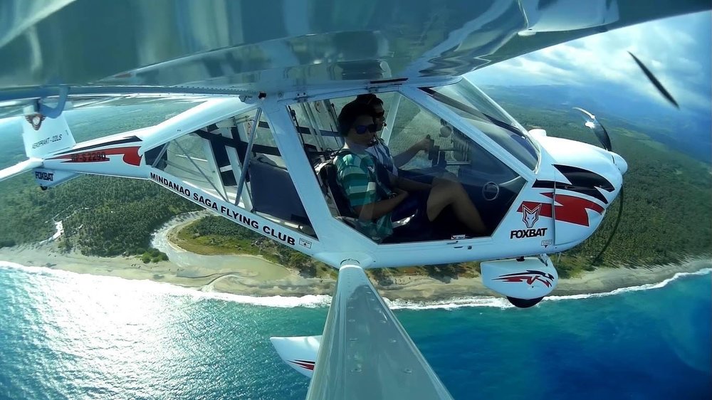 A mini airplane flying above mindanao