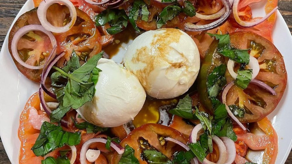 The Maltby Street Market will have you craving for a second serving of tomato and onion salad with burrata. Credit: taylorsofmaltbyst