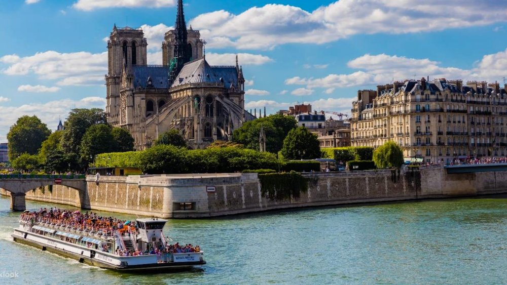 See the Notre Dame Cathedral in a new light from the river. 