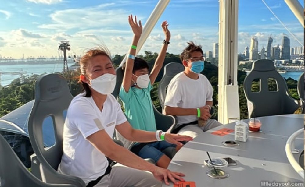 girl and boys having fun at skyhelix sentosa