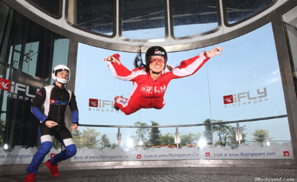 woman flying in the air at ifly singapore