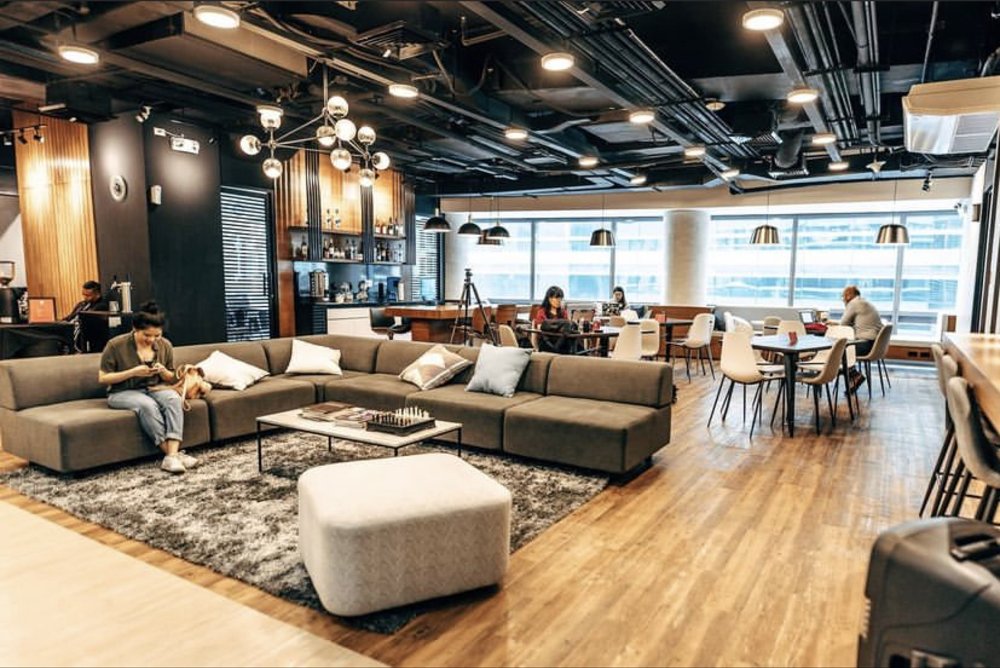 Busy people in coworking studio