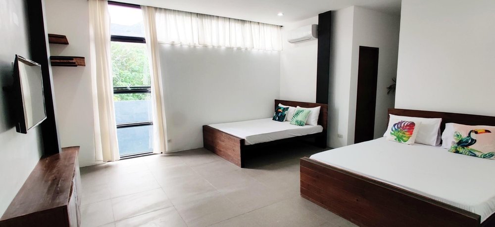 Casa Tropica room with two beds