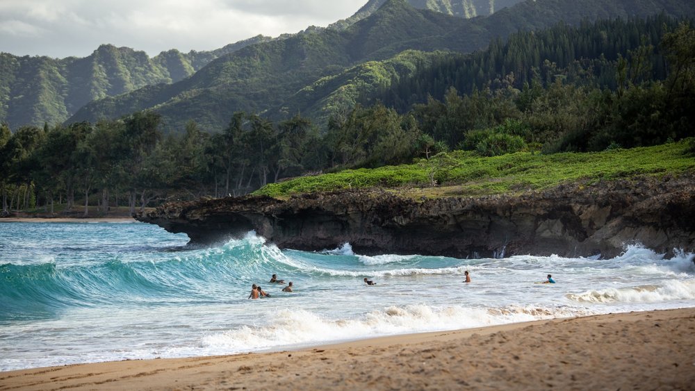 Hawaii’s agreeable weather makes it a perfect surfing spot. Photo by Luke McKeown on Unsplash