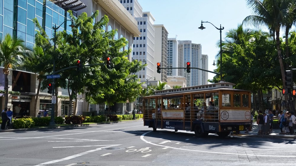 Try to blend in with the locals as you wait for the bus.  Image credits: Jeremy Bezanger on Unsplash