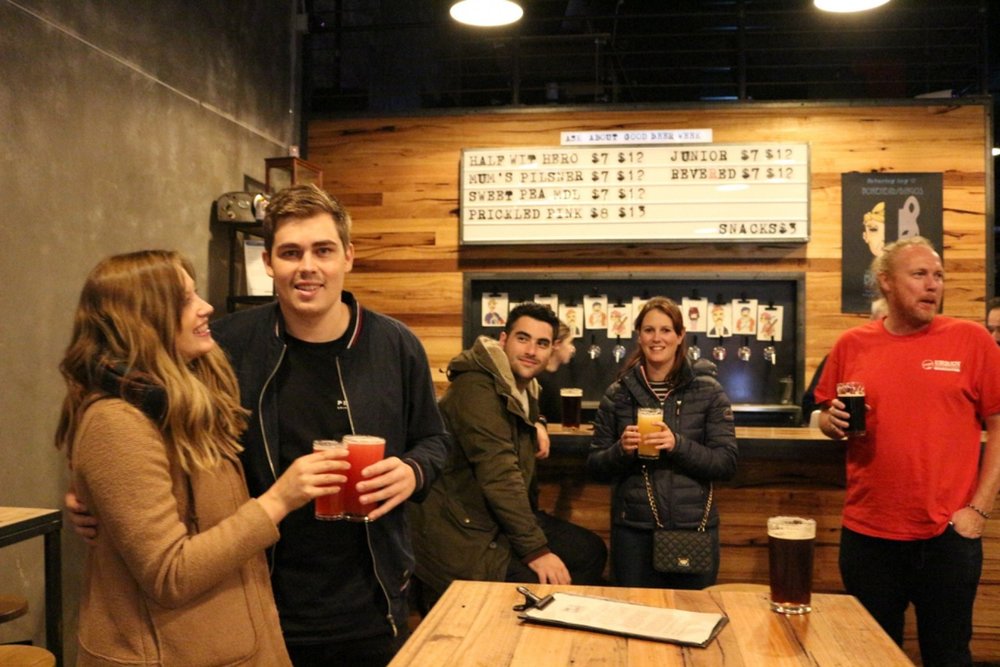 people in a Melbourne bar enjoying craft beer