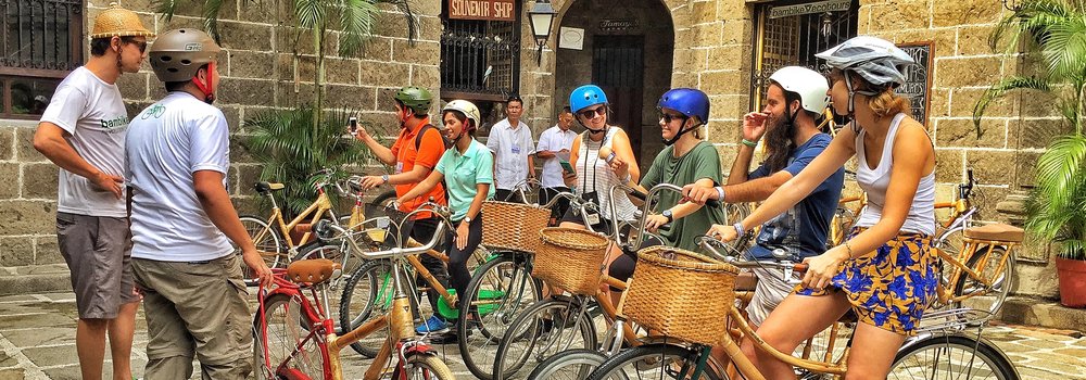 Tourist enjoying strolling using bamboo bike