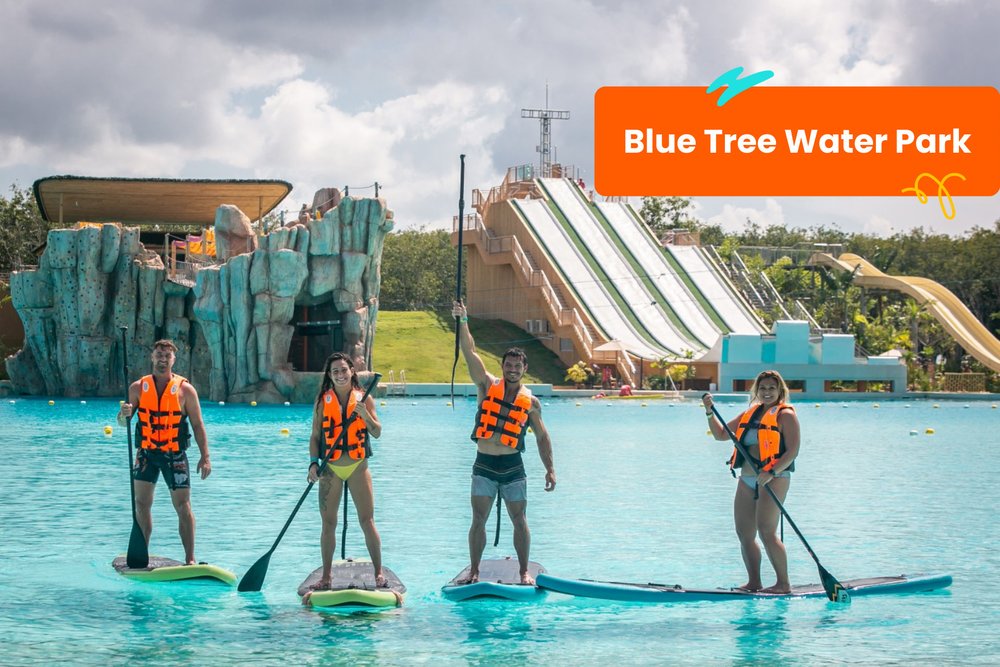 people on standing on paddle boards at Blue Tree Waterpark in Phuket