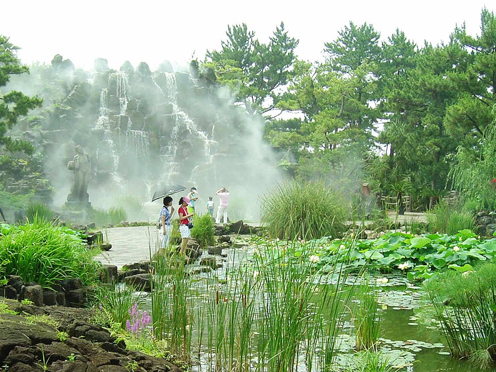 People walking around in Hallim Park