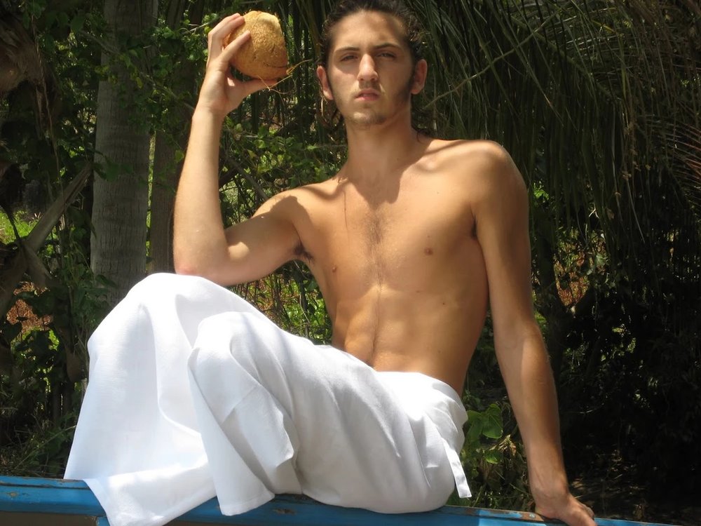 Men in a white wrap pants