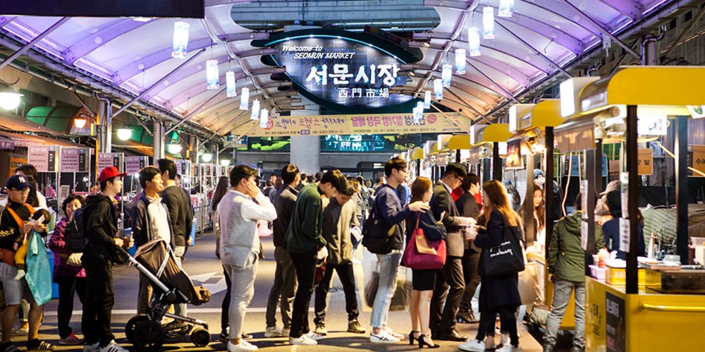 Many people buying different items at Seomun Market