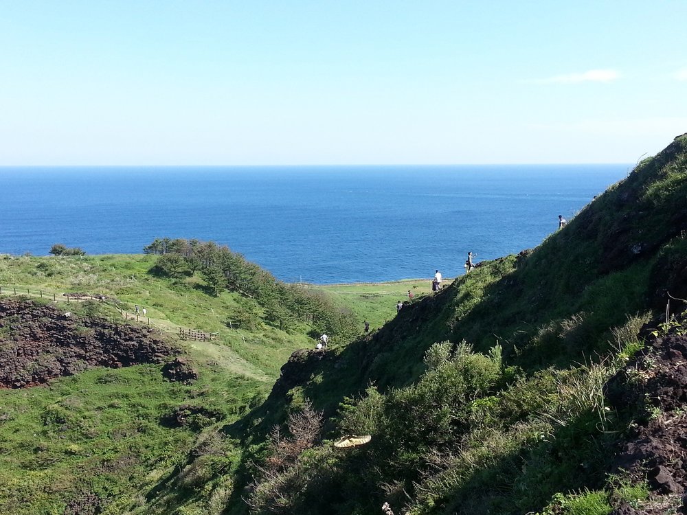 People hiking on Jeju Olle Trail Route