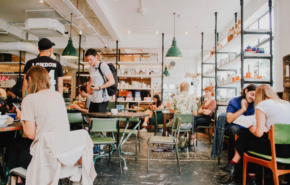 People in the cafe having a coffee break