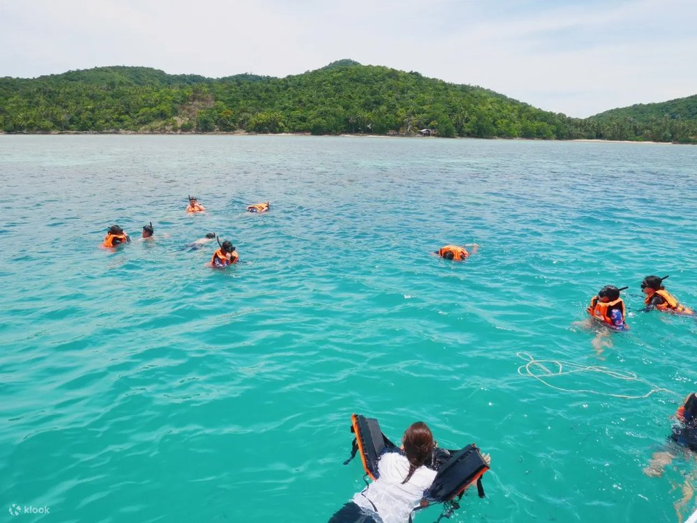 People swimming in the beach